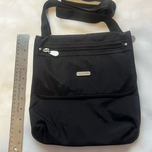 Wonderful bag for travel. There are many places to store items. Light weight.